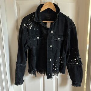 Black denim jacket.